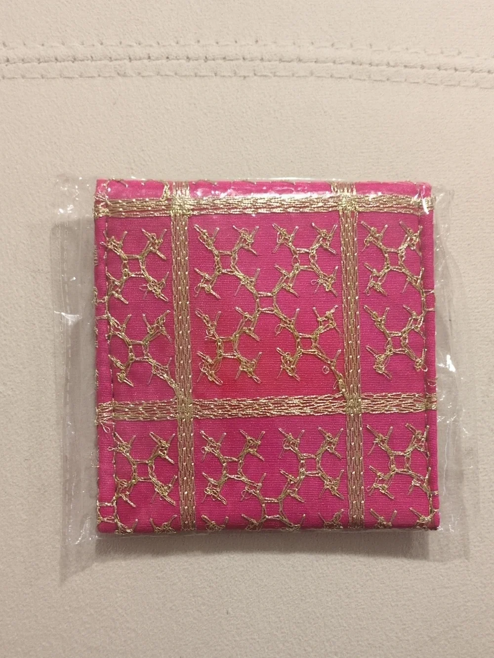 Pink Fabric Pouch with Traditional Gold Embroidered Pattern